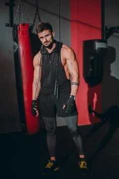 In front of the camera charismatic guy with a brutal face after his workout Stock Photos