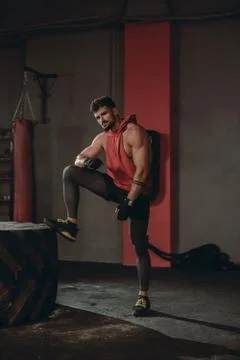 In front of the camera charismatic guy with a brutal face after his workout Foto stock