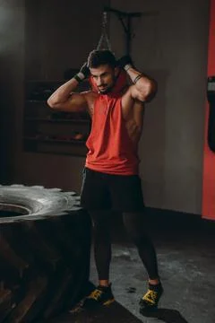 In front of the camera charismatic guy with a brutal face after his workout Stock Photos