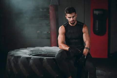 In front of the camera charismatic guy with a brutal face after his workout Stock Photos