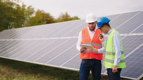 In front of the camera charismatic multiracial ecological engineers discussing Stock Footage 164547936