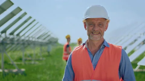 In front of the camera closeup charismatic and good looking man engineer posing Stock Footage 230090290