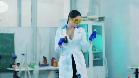 In front of the camera concept of biotechnology pharmaceutical industry lady Stock Footage 153082720