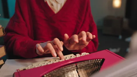 In front of the camera details of a lady type some documents in front of the Video stock 144242547