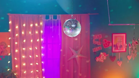 In front of the camera details of a twist disco ball in a lady bedroom Stock Footage 131185034