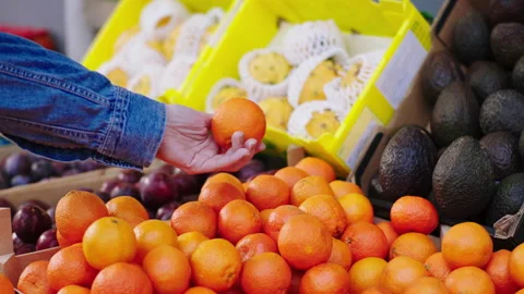 In front of the camera fresh vegetables shop customer pick up some fresh eco Stock Footage 171316246
