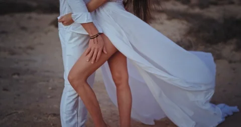 In front of the camera very sensual couple in the middle of amazing landscape Stock Footage 126708839