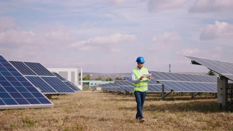 In front of the camera young man ecological engineer using digital tablet to Video stock 167220290