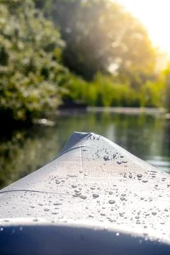 Front of a canoe on the river Stock Photos