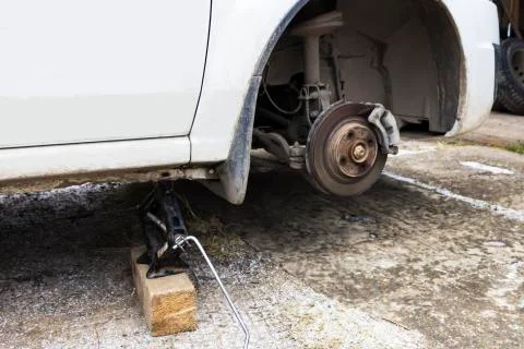 Front car disc brake in process of replacement. Stock Photos
