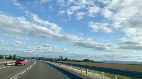 Front car glass view on highway. Road trip. Real time video. Stock Footage 121663603