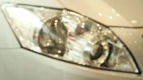 Front car headlight blur-focus Stock Footage 65090004