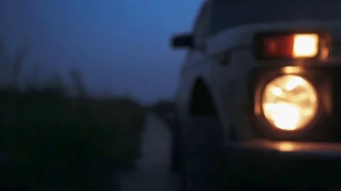 Front of the car at night with headlights turned on. Stock Footage 78626168