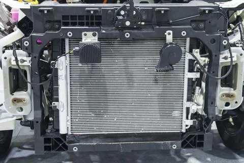 Front car structure with radiator and black steel mounting bracket. Stock Photos
