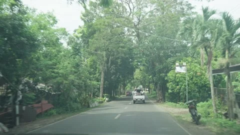 Front car view scenery of countryside in Philippine Stock Footage 325415721