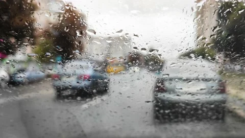 Front car window covered with rain drops 스톡 동영상 161265931