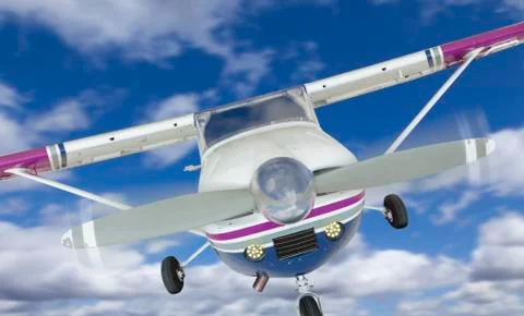 The Front of A Cessna 172 Single Propeller Airplane In The Sky. Stock Photos