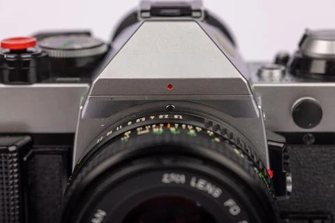 Front close-up of a classic camera on a white backdrop, emphasizing the det.. Stock Photos