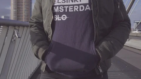 Front Close Up Dramatic 4k shot of a girl walking on a bridge Stock Footage 89778382