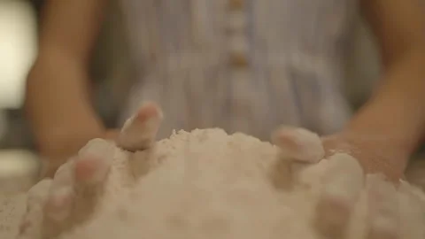 Front close-up of hands kneading flour Vidéo 336374763