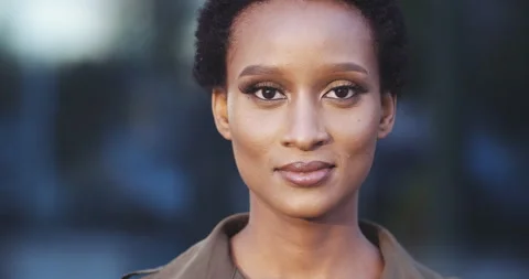 Front closeup portrait of young mixed race beauty African American black woman Stock Footage 137885214