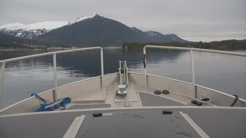 Front deck of boat driving in Alaska Stock Footage 104867648