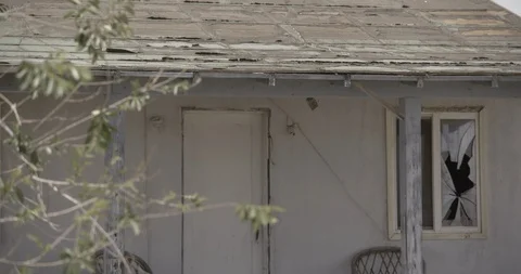 Front of Dilapidated and Abandoned House Stock Footage 89942301