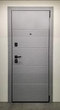 Front door design with a light grey color and modern features in a resident.. 写真素材
