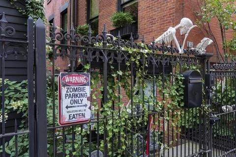 The front door of a house with Halloween decorations. Stock Photos
