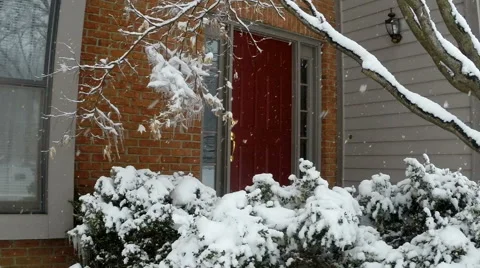 Front door of house with snow falling 2 Stock Footage 47154519
