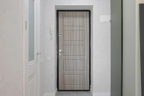 Front door inside the apartment interior Stock Photos