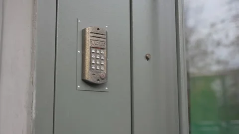 Front door intercom demostrates sleek design closeup Stock Footage 306412575