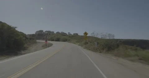 Front driving plate - Highway 1 at Mile 70, Ragged Point Stock Footage 294933529