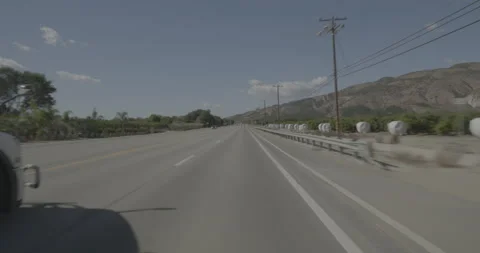 Front driving plate - Highway 126 at Mile 27, Lake Piru Vídeos de archivo 294695690