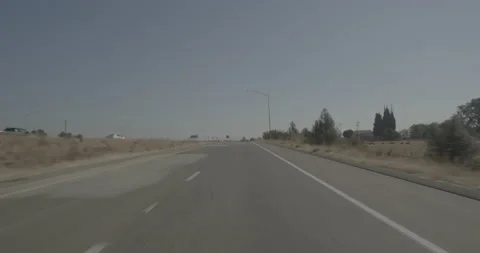 Front driving plate - Highway 180 at Temperance Avenue, Fresno Stock Footage 295192547