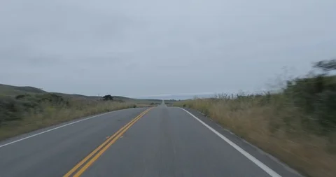 Front driving plate - PCH at Arroyo Hondo, San Simeon Stock Footage 113857997