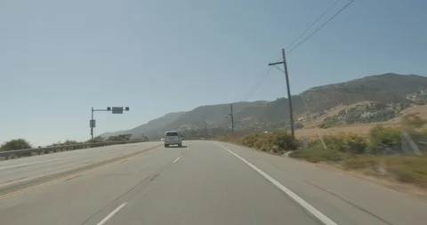 Front driving plate - PCH at Trancas Canyon Rd, Malibu Stock Footage 101770897