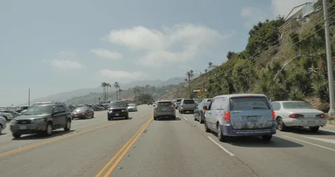 Front driving plate - PCH at Will Rogers State Beach, Santa Monica Stock Footage 102007351