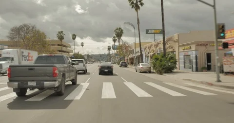 Front driving plate - Van Nuys Blvd at Erwin St, Van Nuys Stock Footage 113789734