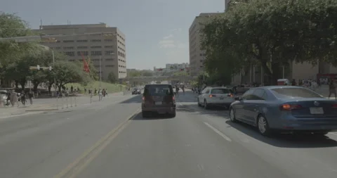 Front driving plate - West Dean Keaton Street at Wichita Street, Austin Stock Footage 253497236