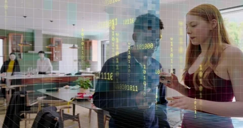 Front duo talking, sparking AR grid into binary streams over room, tall man Stock Footage 323454320