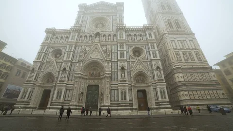 Front of Duomo and bell tower on foggy morning is magical Stock Footage 103237525