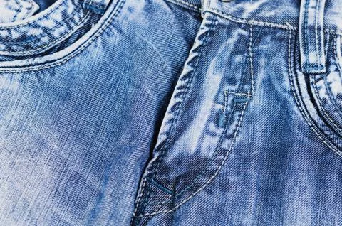 Front empty pockets and buttoned zipper on blue jeans Stock Photos