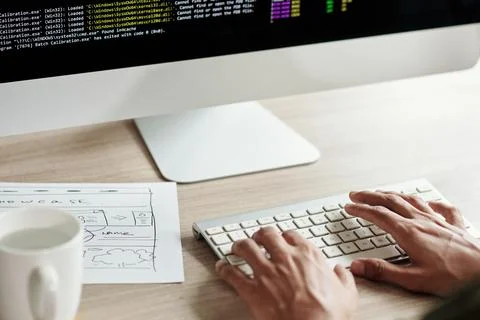 Front end Developer Checking Website Stock Photos