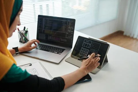 Front End Developer Checking Wireframe Stock Photos