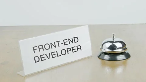 Front-end Developer Office or Room with Hand Ringing The Bell on Desk Stock Footage 300714985