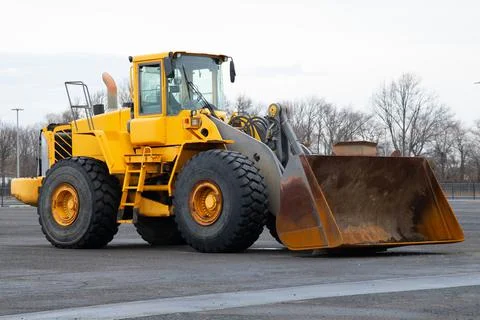 Front-end loader in action on the loading Stock Photos
