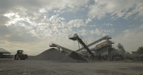 Front End Loader Drive By Stone Quarry (4K) Stock Footage 61327077