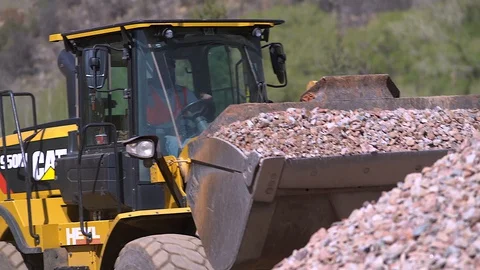 Front End Loader Dumps Gravel, real time Stock Footage 129822264