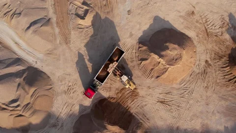 Front end loader load sand and gravel in dump truck in open pit. Heavy machinery 스톡 동영상 194817018